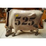 A Studio pottery model of a cow (number 525)