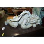 A modern model of a sleeping cherub