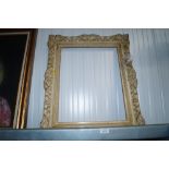 An ornate picture frame AF