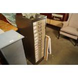 A metal multi drawer filing chest