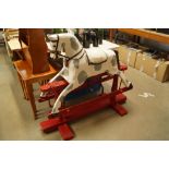 A wooden rocking horse