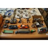 A collection of diecast and other model vehicles;