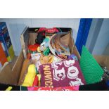 A box containing children's toys and games; advert