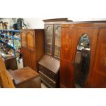 An oak and leaded glazed bureau bookcase