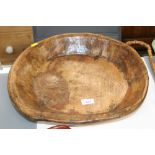 A dug out wooden bowl