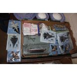 A box of assorted die-cast planes and ships for Wa