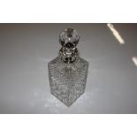 A square cut glass spirit decanter with silver col
