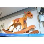 A wooden rocking horse