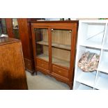 An Edwardian mahogany and inlaid display cabinet