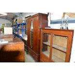 An Edwardian mahogany mirrored door wardrobe