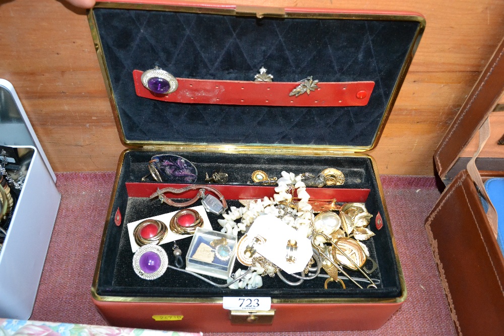 A box containing various costume jewellery