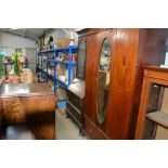 An oak and leaded glazed bureau bookcase