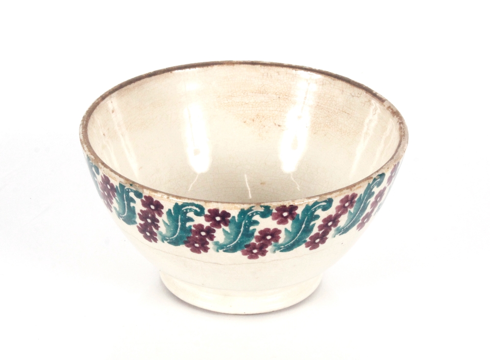 A antique spongeware bowl, 13.5cm dia. x 7cm high