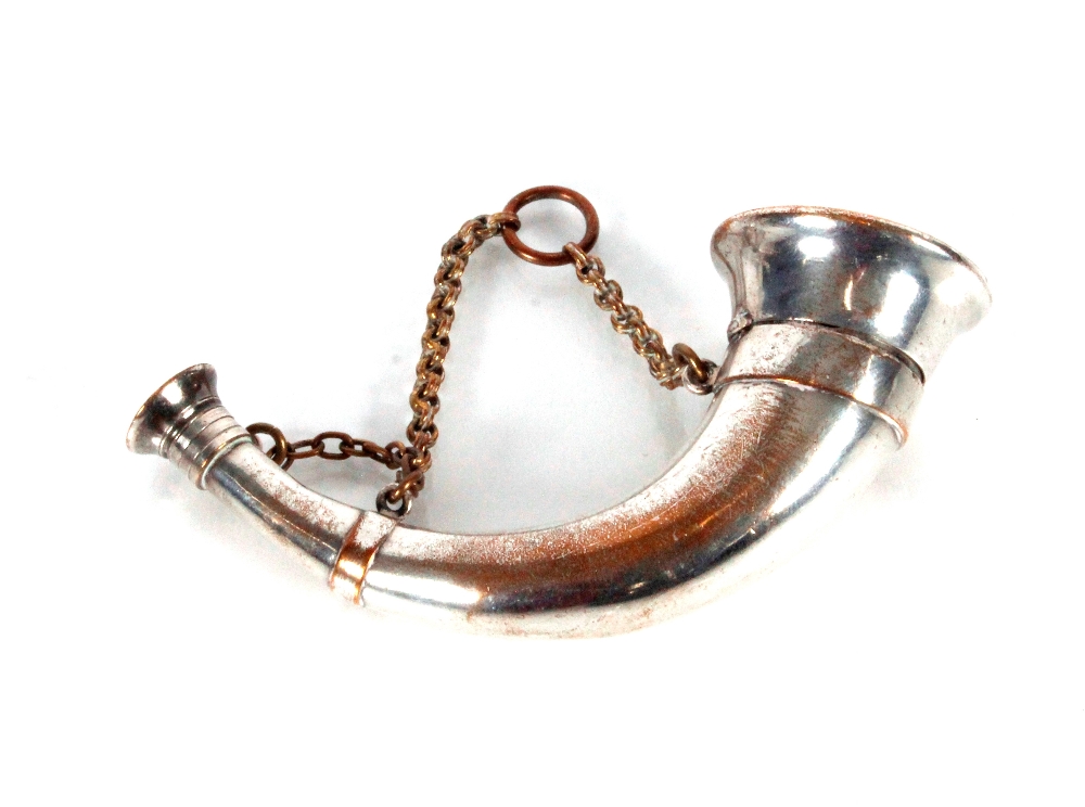 A 19th Century plated vinaigrette by S. Mordan & Co. of horn shape, the lid with monogram