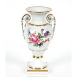 A Meissen baluster twin handled vase with floral decoration, heightened in gilt, 29cm high