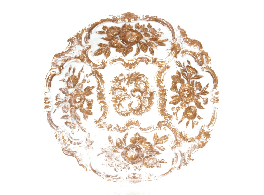 A large Meissen plate with raised gilt floral decoration, 31cm dia.