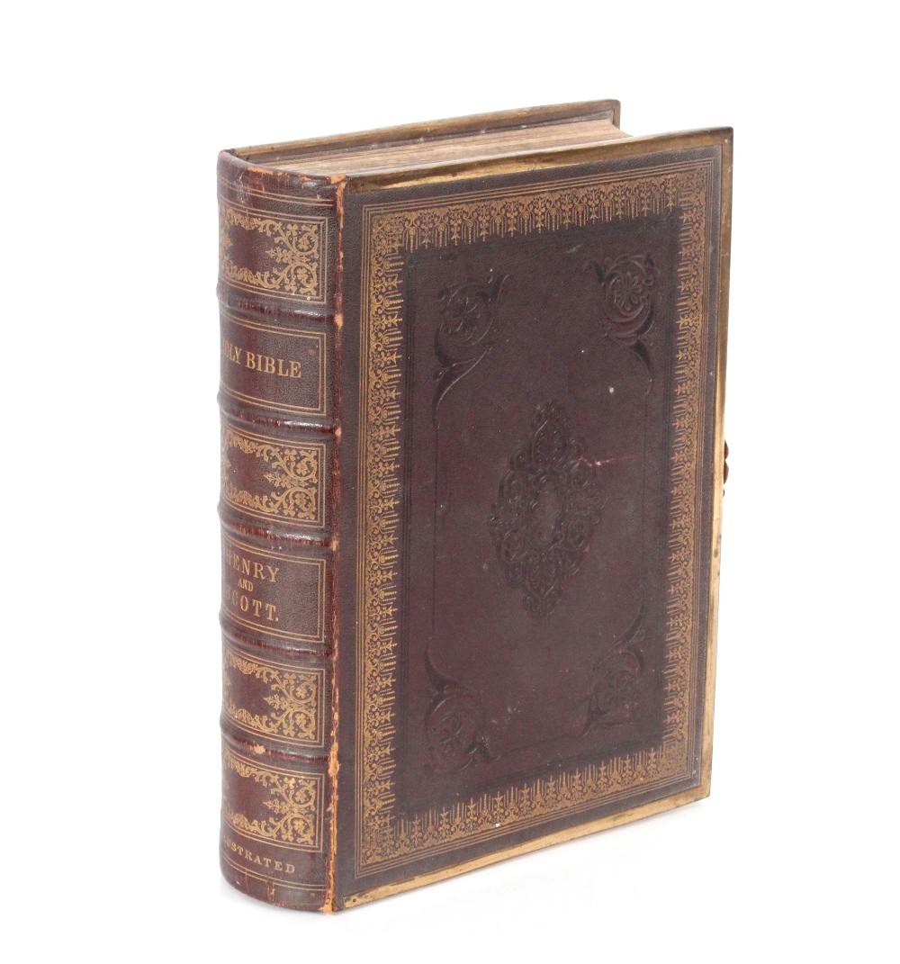 A leather and brass bound Henry & Scott Bible