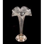 An etched opaque glass trumpet shaped posy vase, raised on silver circular stepped foot,
