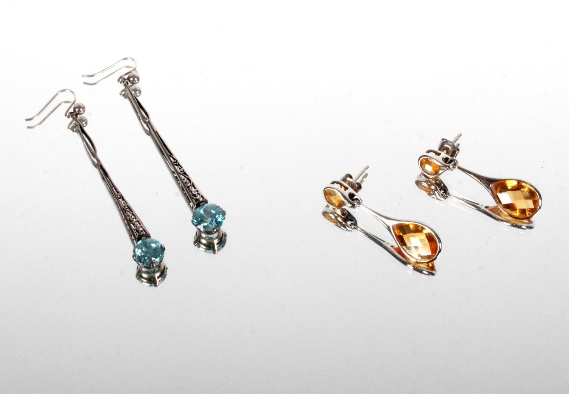 A pearl necklace; a pair of silver ear-rings; and a pair of 14ct gold and topaz ear-rings