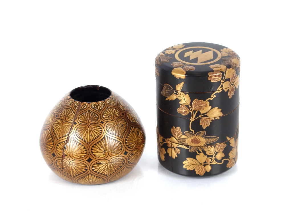 A fine 19th Century Japanese lacquer four compartment cylindrical stacking box, 7.5cm high; and a