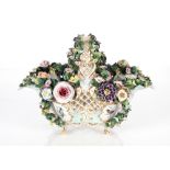 A Meissen floral encrusted posy basket, having pierced decoration and painted panels of birds