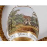 A well painted 19th Century Berlin porcelain egg shaped bell pull, hand painted with a view entitled