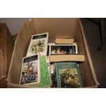 A box of various literature books