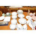 A quantity of Royal Doulton "Burgundy" dinnerware