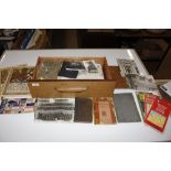 A wooden drawer and contents of various post-cards