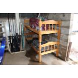 A pine bunk bed with ladder