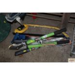 A quantity of tools including bow saw. saws, ratch