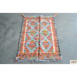 An approximate 4' x 2'5" Chobi Kelim rug