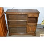 An Old Charm oak linen fold decorated bookcase fit