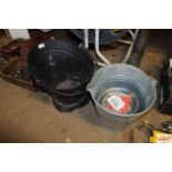 A galvanised pail, a metal coal bucket etc.