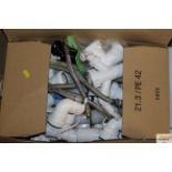 A box of plumbing fittings