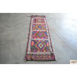 An approximate 7'8" x 2'2" old Suzani runner