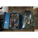 A bag of tools and a tool box and contents