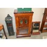 An Edwardian mahogany music cabinet