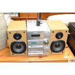 A Sony stereo and pair of speakers