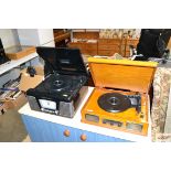 A vintage style record player and a Crosley radio