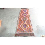 An approximate 10'3" x 2'5" old Suzani Kelim runne