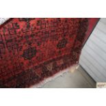 An approximate 8' x 5'9" red and blue Eastern patt