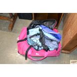 A collection of sports bags and rucksack