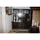 A Victorian oak dresser fitted two central drawers