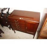 A music cabinet fitted five drawers