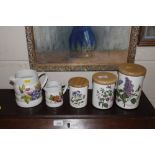 Three Portmeirion graduated storage jars and a pai