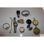 A tub of various wrist watches etc