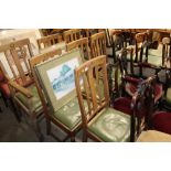 Seven oak slat-back dining chairs comprising of si