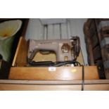 A Singer electric sewing machine in fitted case, s
