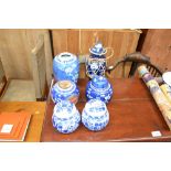 A quantity of blue and white ginger jars together